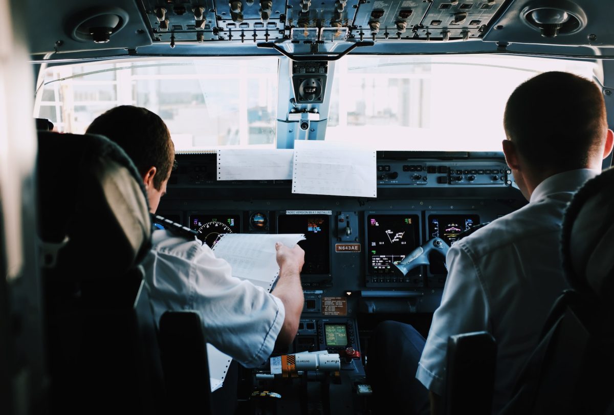 Two pilots flying a plane.