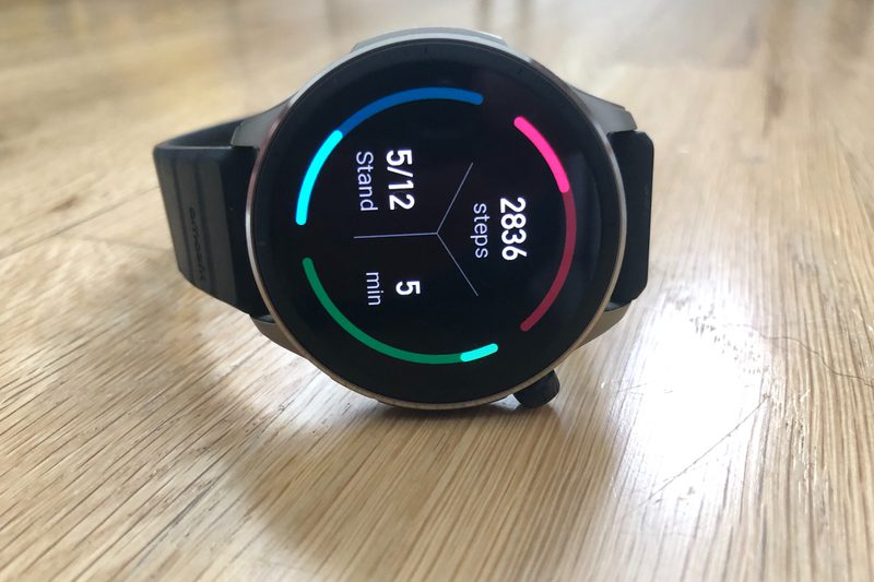 Amazfit GTR 4 watch on hardwood floor.