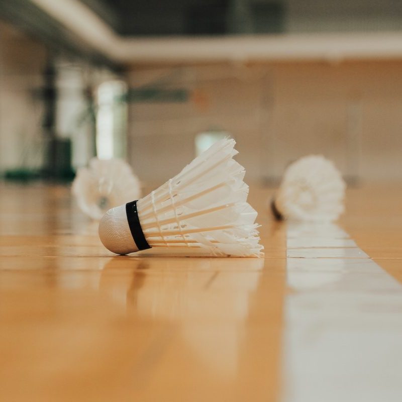 Badminton birdies on the gym floor
