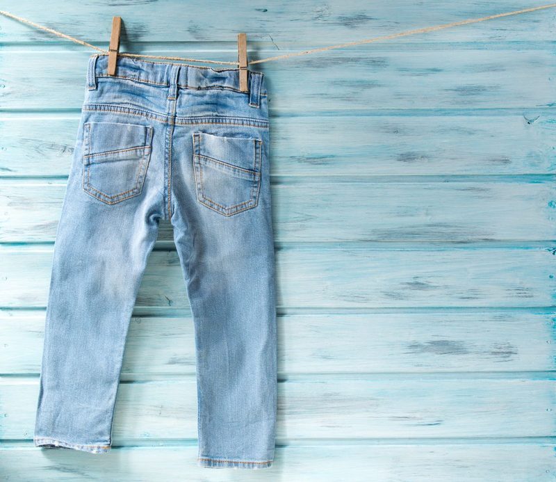 jeans airing out on a clothes line
