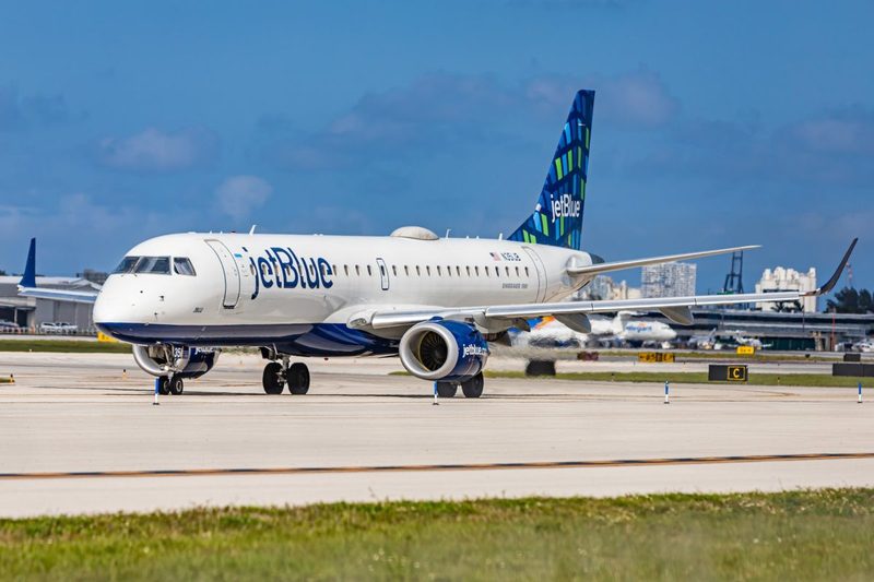 A JetBlue airplane about to get ready to take off.
