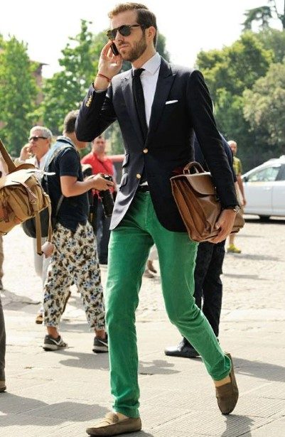 man in green pants and navy blazer
