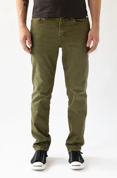 man wearing olive jeans
