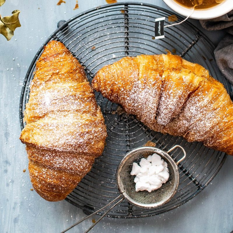 Croissants dusted with powdered sugar