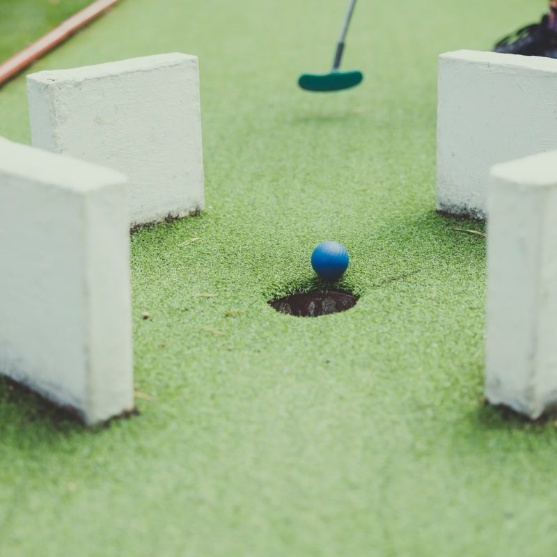 A mini golf putt shot