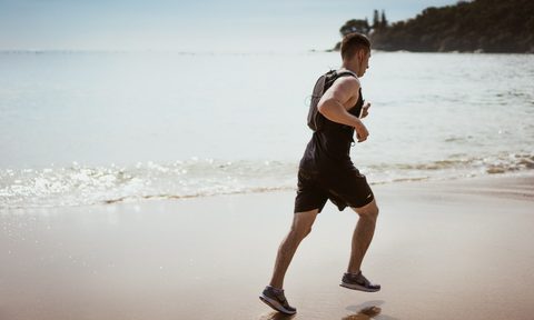A man running on the beach