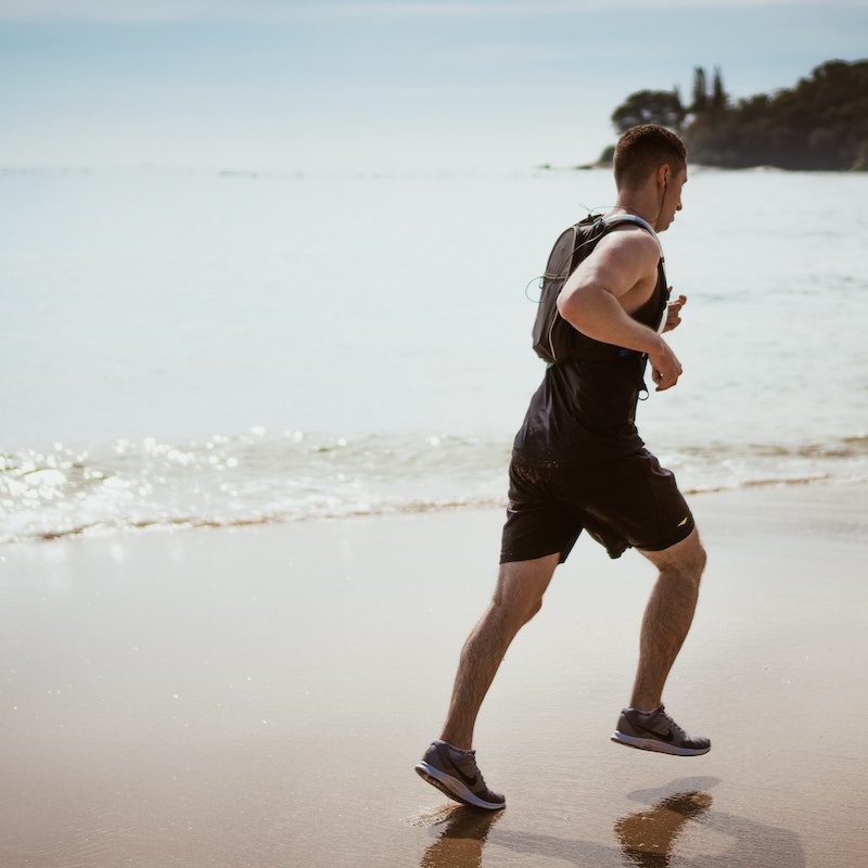 A man running on the beach