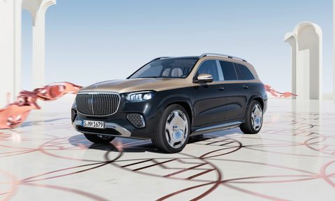 Front end angle of the 2024 Mercedes-Benz GLS Maybach 600 parked in front of the Maybach logo.