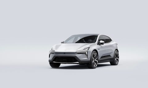 Front end angle of the 2025 Polestar 4 from the driver's side in front of a white background.