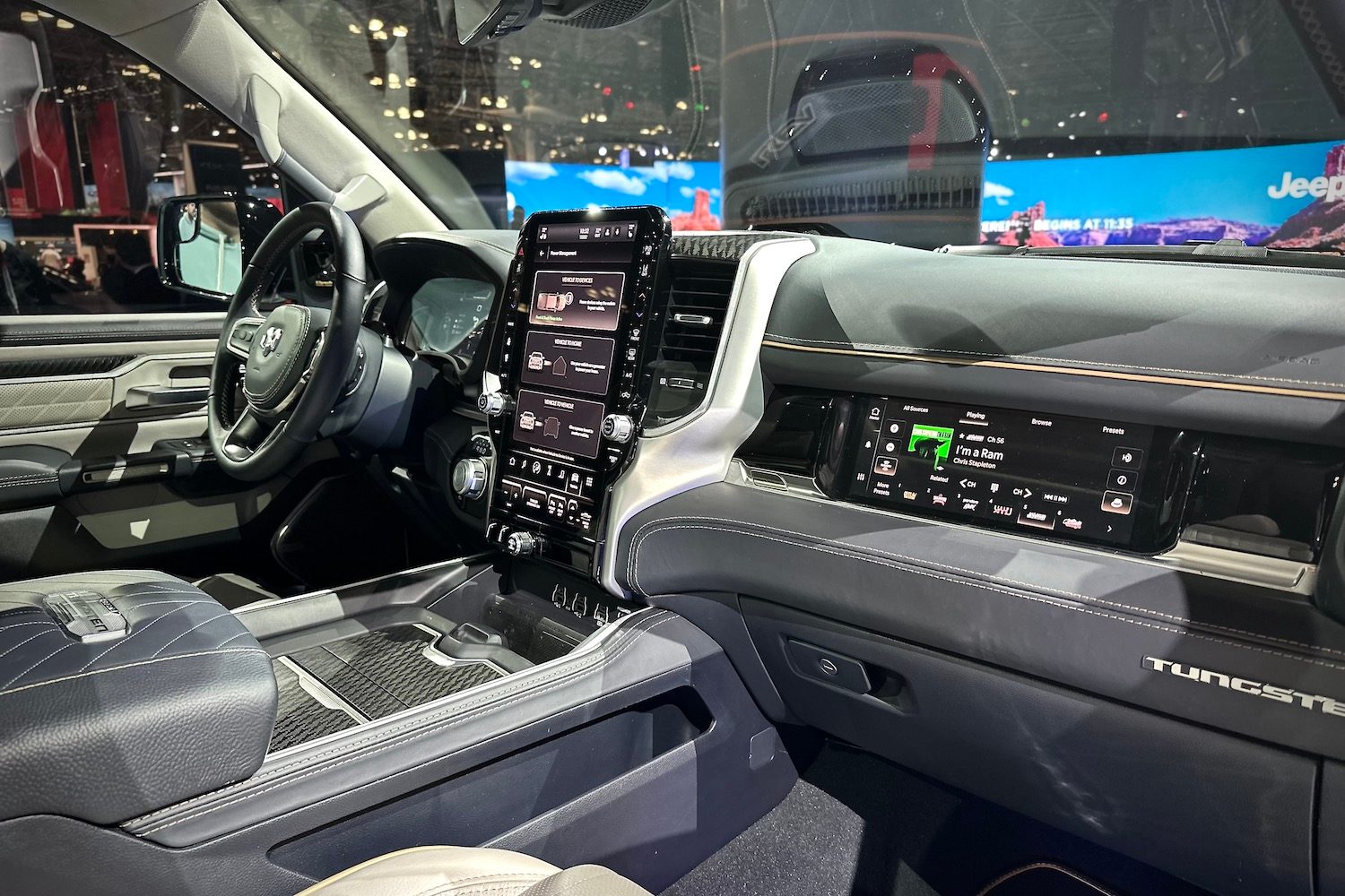 Close up dashboard on the 2025 Ram 1500 REV from the passenger's side.