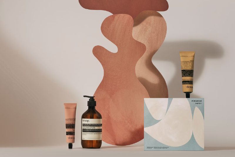 Aesop product display with some decor in the background.