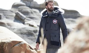 A man wearing a Canada Goose parka jacket