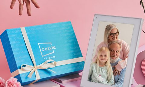 Cozyla smart photo frame for Mother's Day with a pink background.