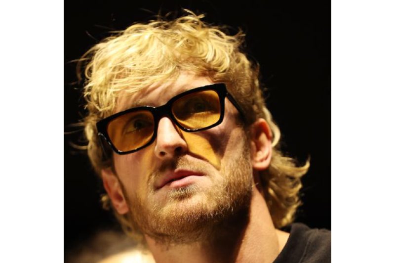Logan Paul wearing shades with a mullet.