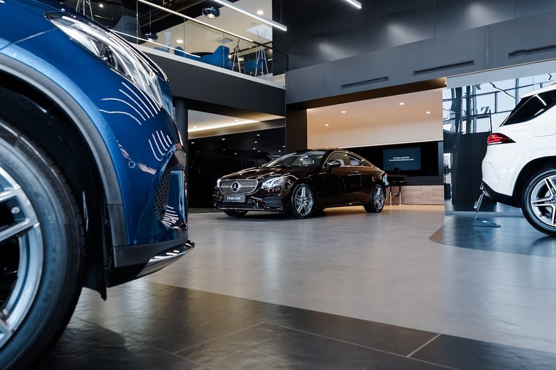 Mercedes-Benz E-Class Coupe inside of a Mercedes dealership.