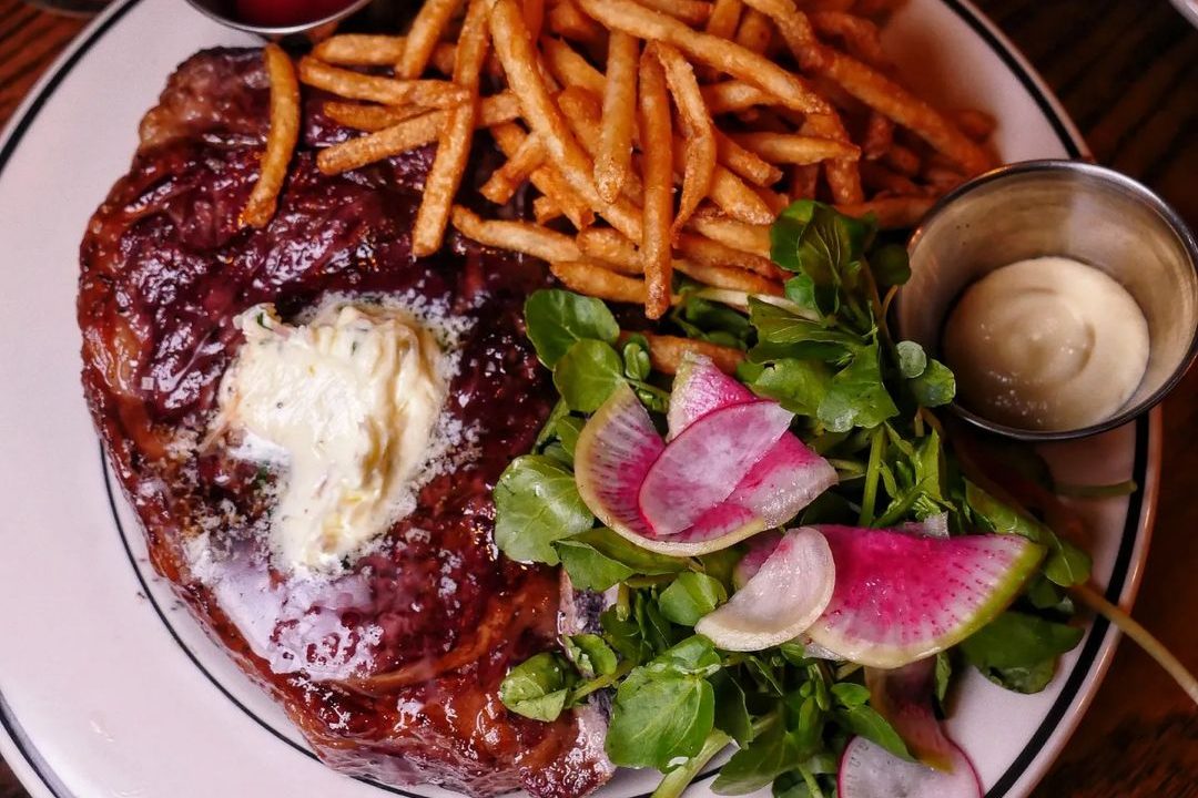 Steak frites on a plate