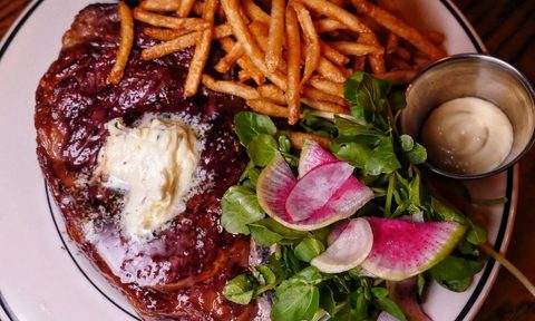 Steak frites on a plate