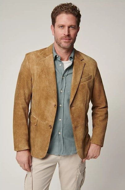 Man wearing Overland Carlisle Distressed English Leather Blazer over denim shirt