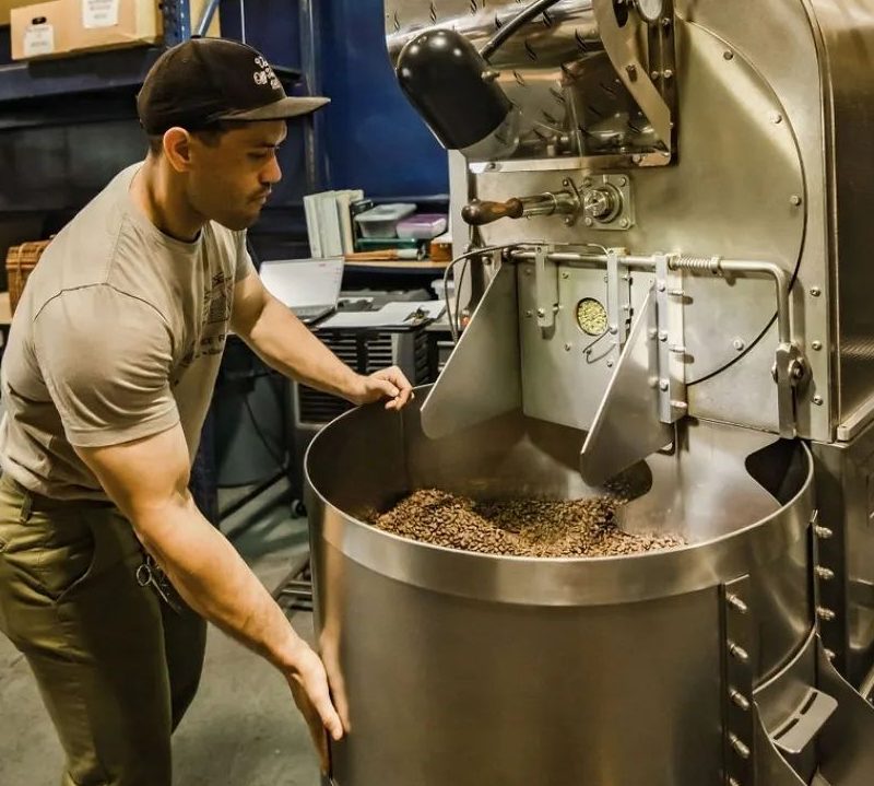 Roasting coffee at Maui Coffee Roasters.