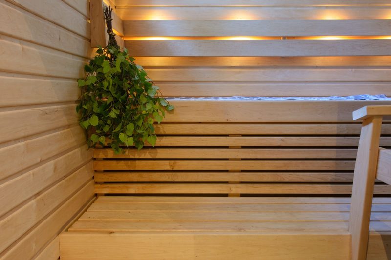 Birch vihta hanging in a Finnish sauna.