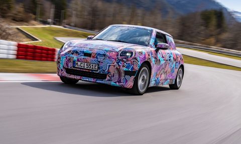 the 2024 Mini Cooper EV driving on the road