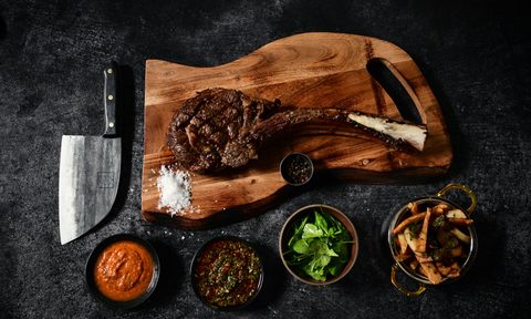 Herd&Grace tomahawk steak on board.