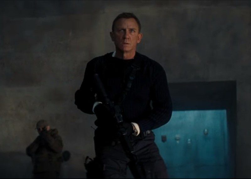 James Bond in Tactical navy ribbed sweater and cargos