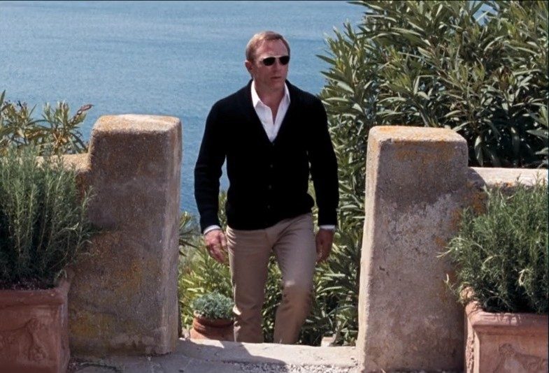 James Bond in black cardigan and chinos in Quantum of Solace