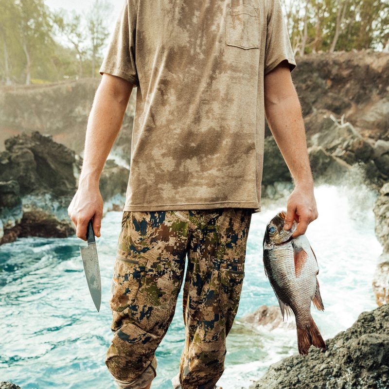 Man using an Anzik knife while fishing