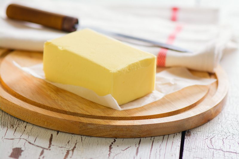 unwrapped butter on a plate