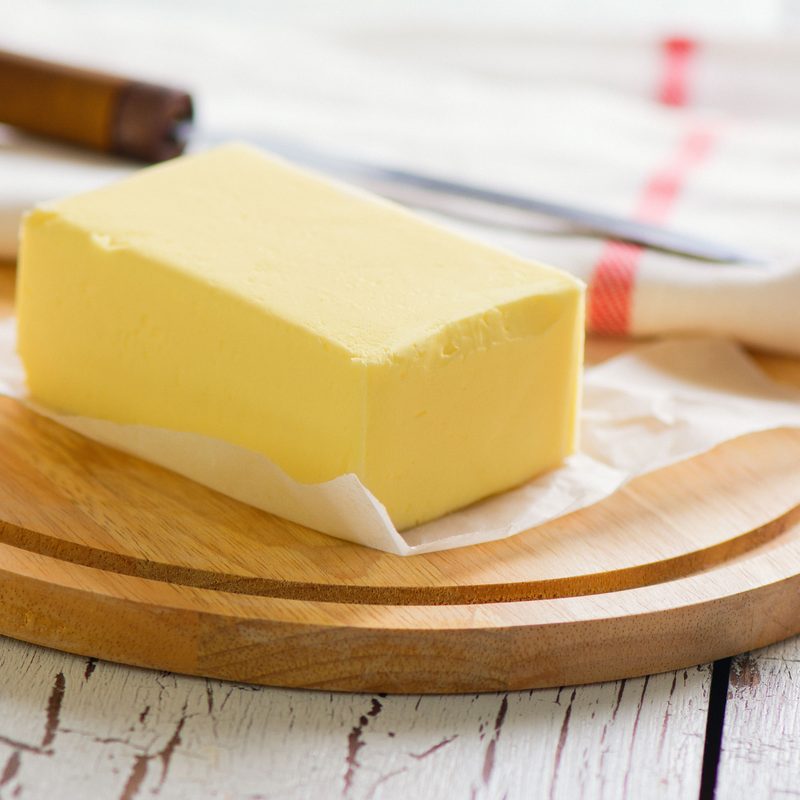 unwrapped butter on a plate