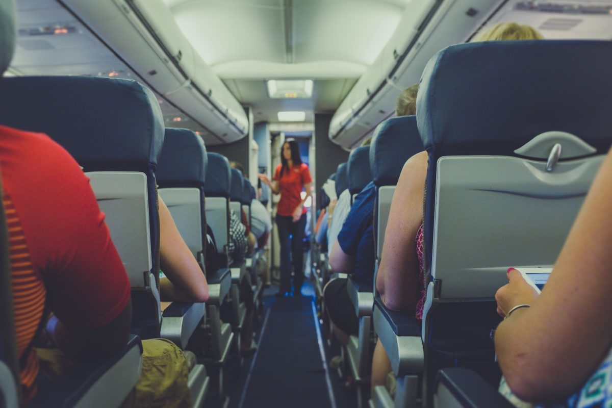 Various passengers on a plane