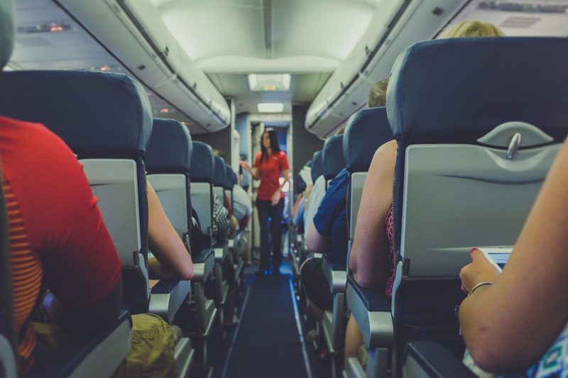 Various passengers on a plane.