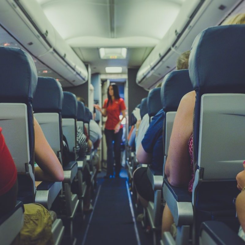 Various passengers on a plane
