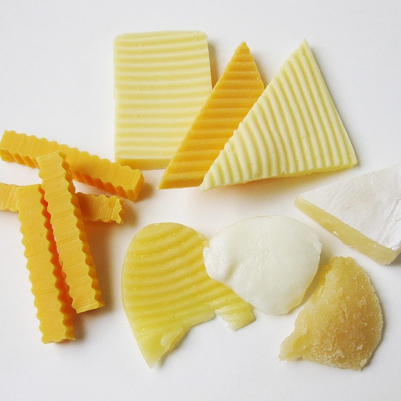Assorted sliced cheeses