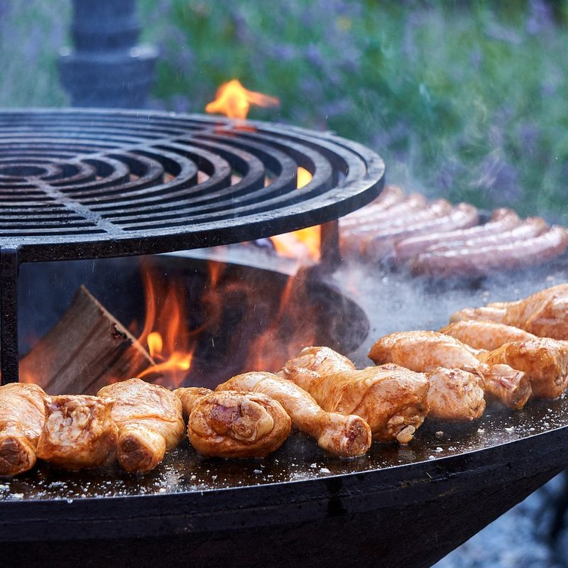 Chicken drumsticks on grill