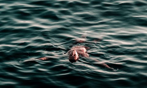 Man swimming in the ocean