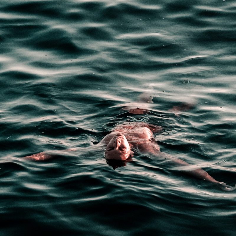 Man swimming in the ocean