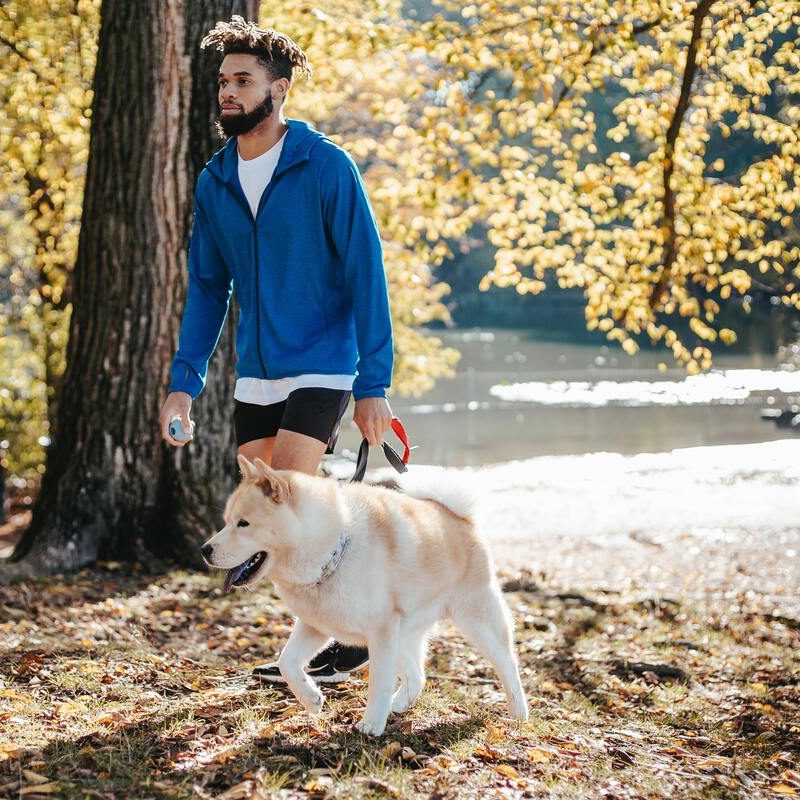 Man walking his dog.