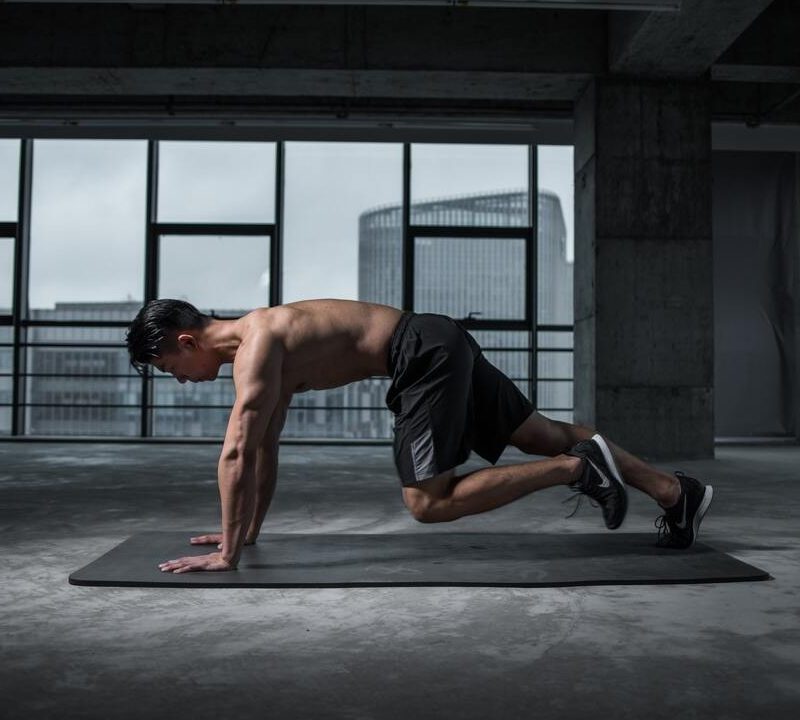 Man doing mountain climbers.