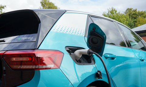 An electric vehicle being charged.