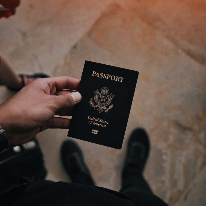 A person holding a passport