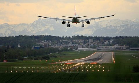 A plane taking off of the runway.