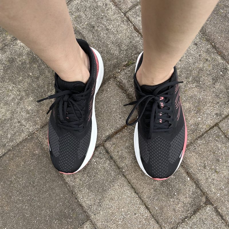 Salomon running shoes on feet