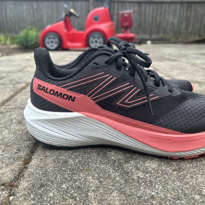 Salomon running shoe on the ground