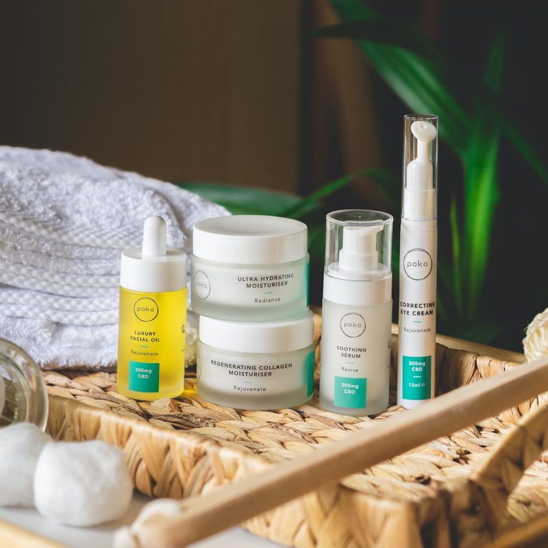 Skincare products with white towel