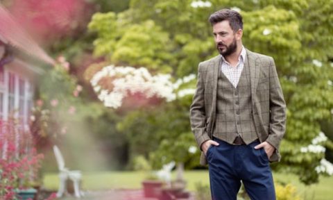 Man in vest and blazer