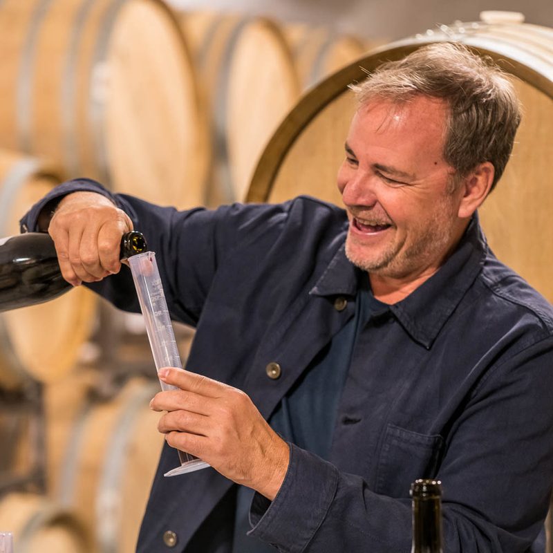 A portrait of The Vines Global founder and CEO Michael Evans.