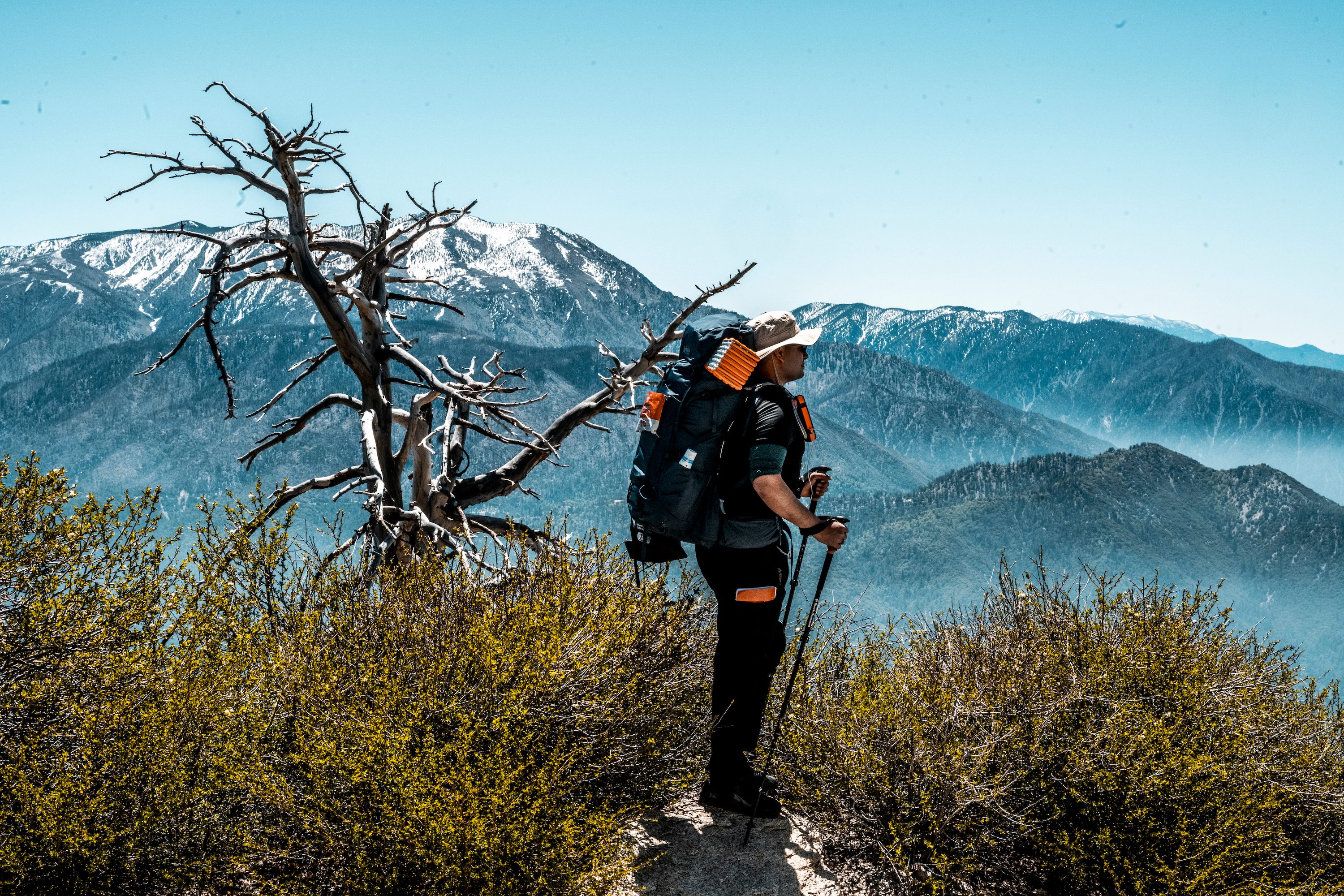 Man hiking on Highlander adventure Highlander Big Bear California USA