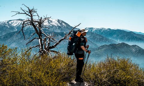 Man hiking on Highlander adventure Highlander Big Bear California USA